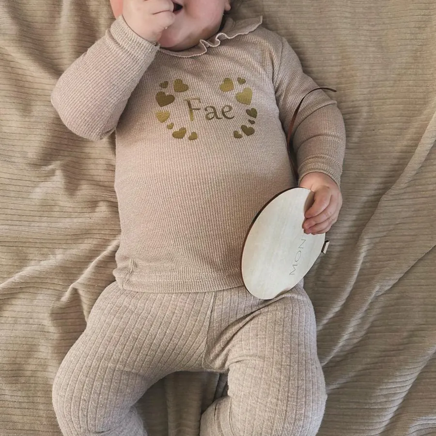 Babypakje met naam in goud