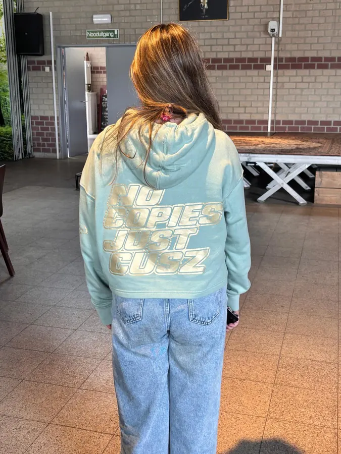 Mintgroene hoodie met No copies just Cusz