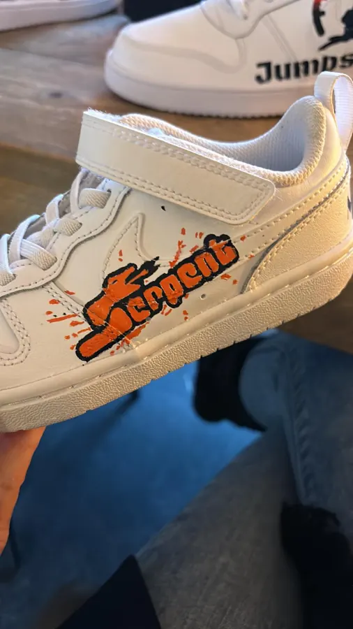 Kindersneaker met oranje Serpent-logo